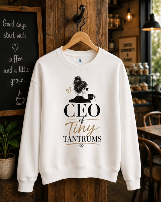 White CEO of Tiny Tantrums sweatshirt displayed on a wooden hanger